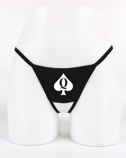 Black crotchless thong with white “Q♠” Queen of Spades graphic — daring kinky lifestyle lingerie from Wicked Boutique®