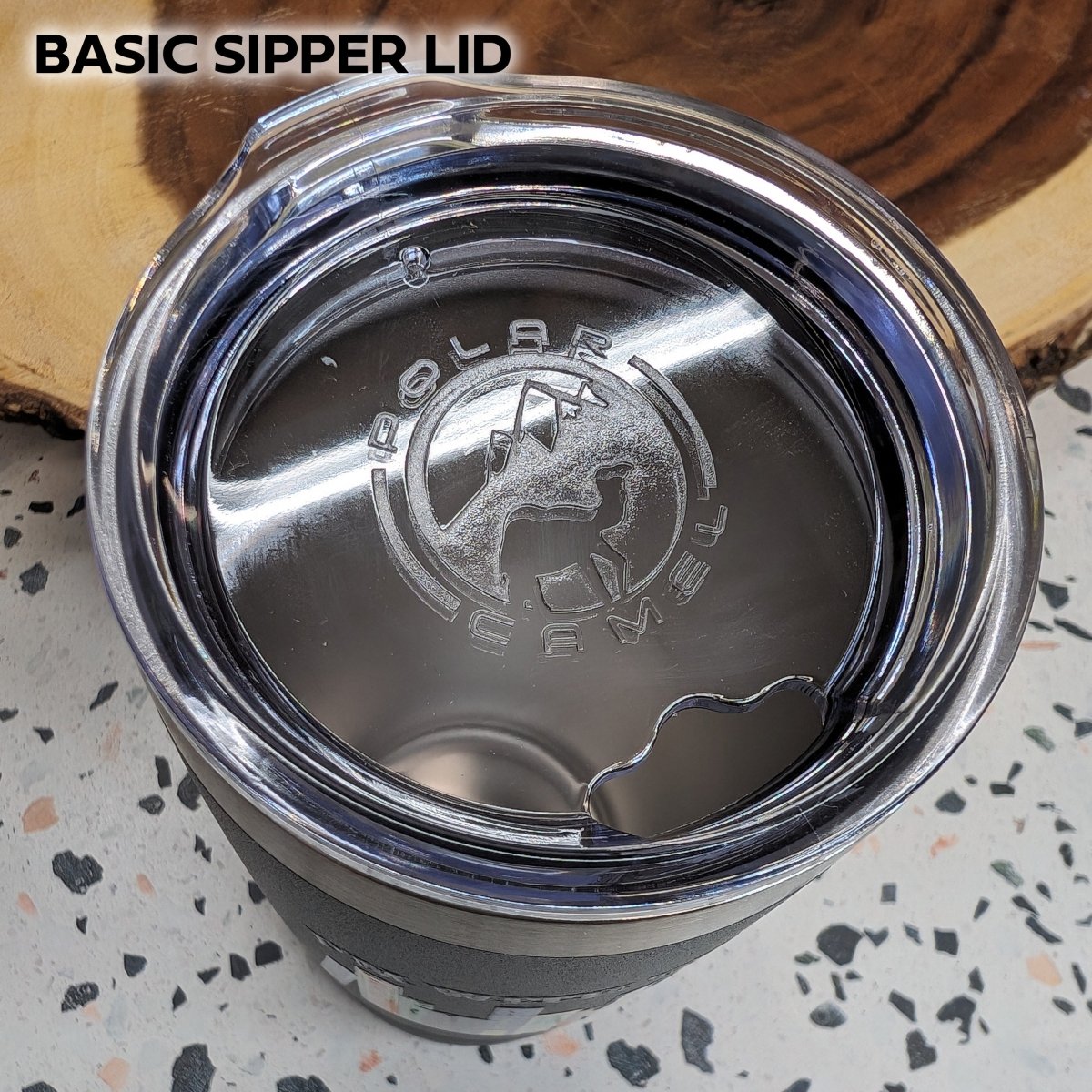 Stainless steel tumbler top view basic sipper lid.