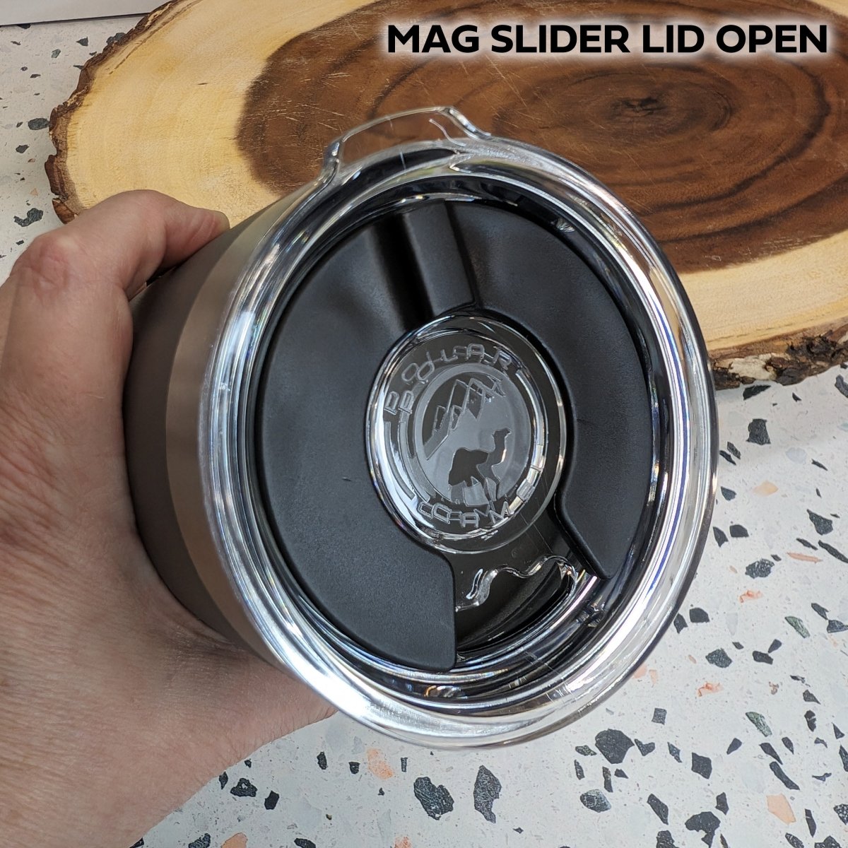 Stainless steel tumbler top view mag slider open.